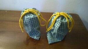 Creatività Storia Passione Collaborazione Sacchetti a quadri verdi e cordino giallo